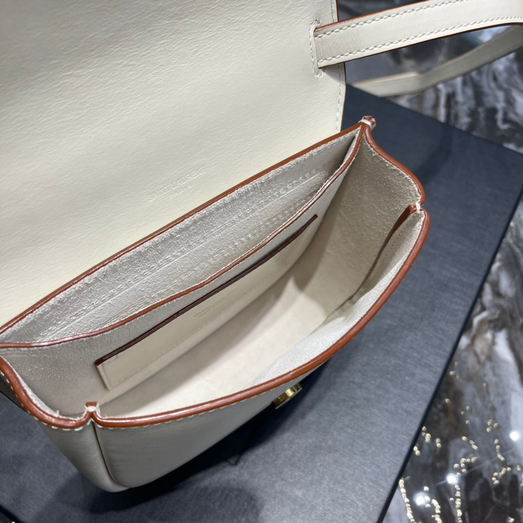 ysl5561240940 kaia small saddle bag white gold hardware 619740