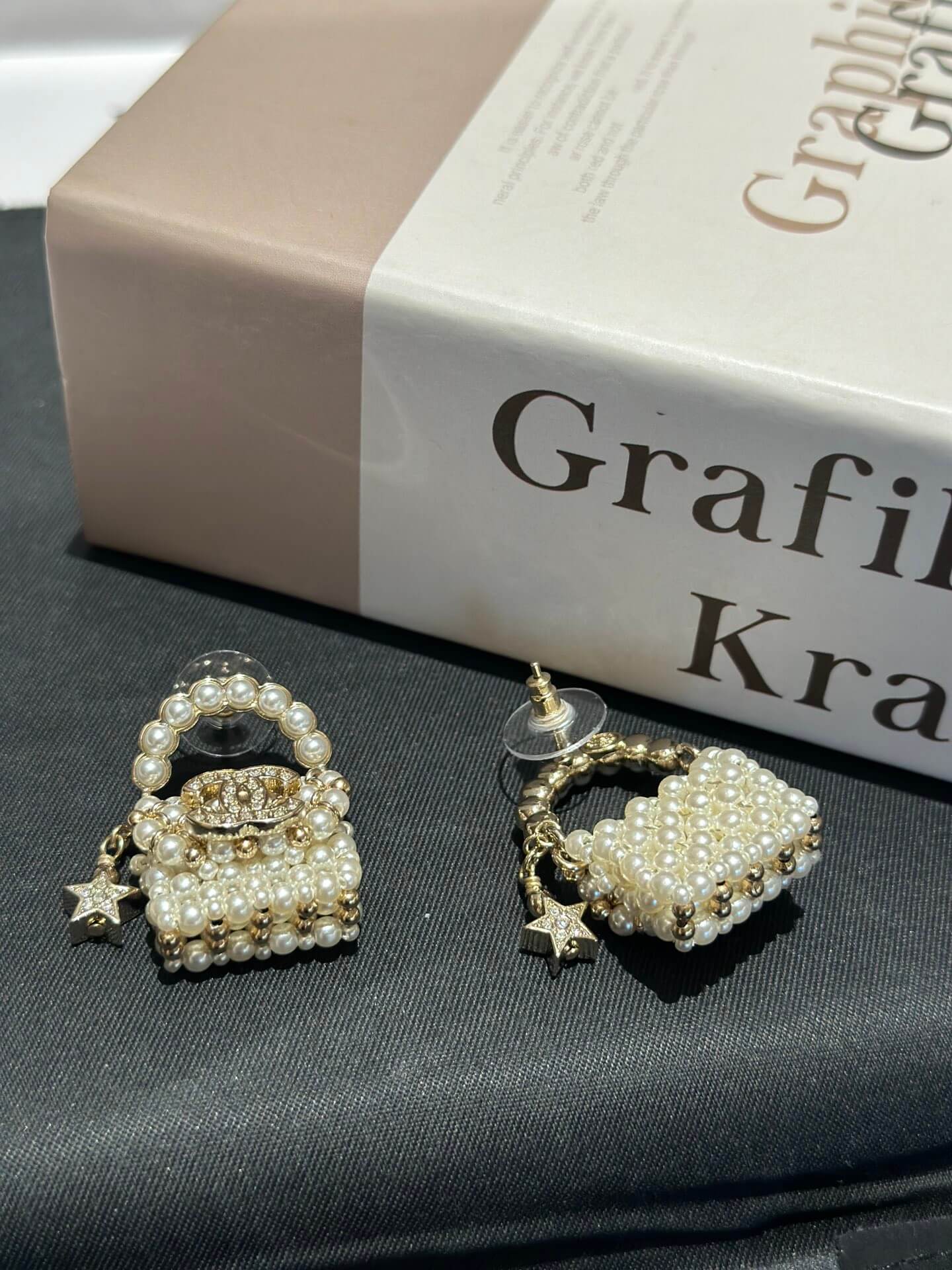 chanels new pearl woven bag star double c earrings ehc3