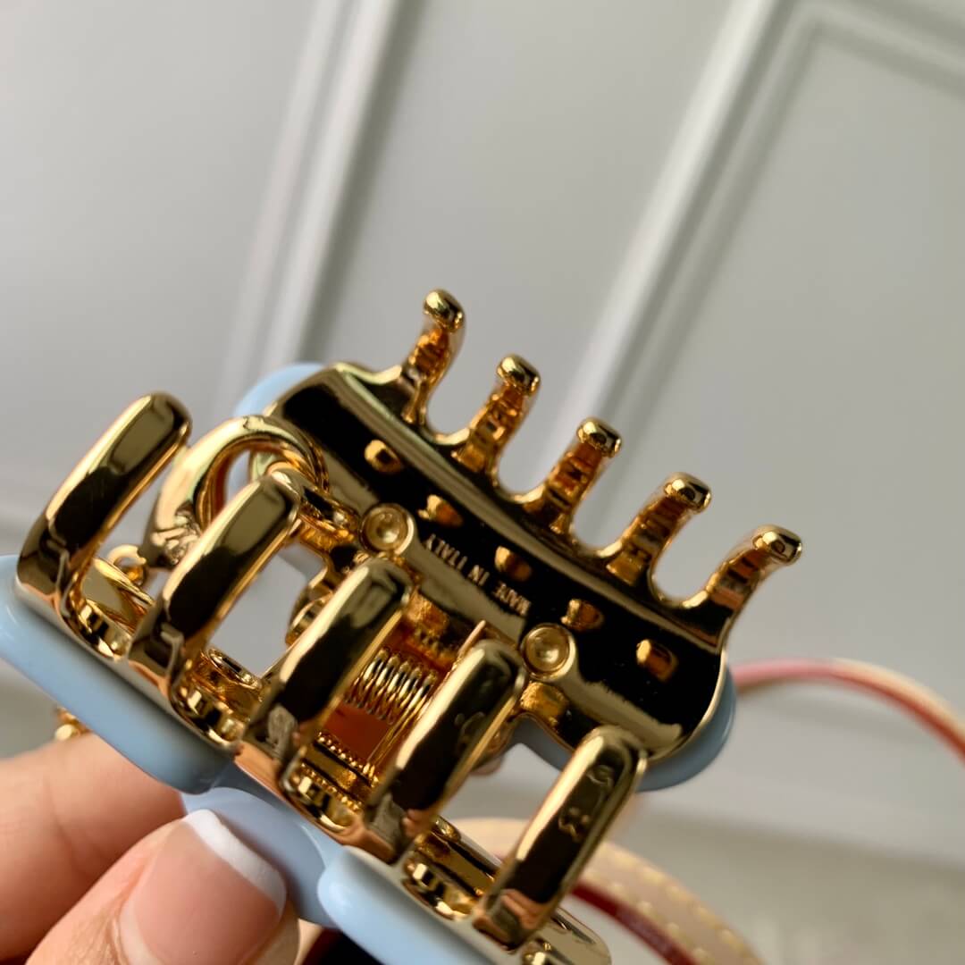 m24144 small reade monogram vernis handbag light blue