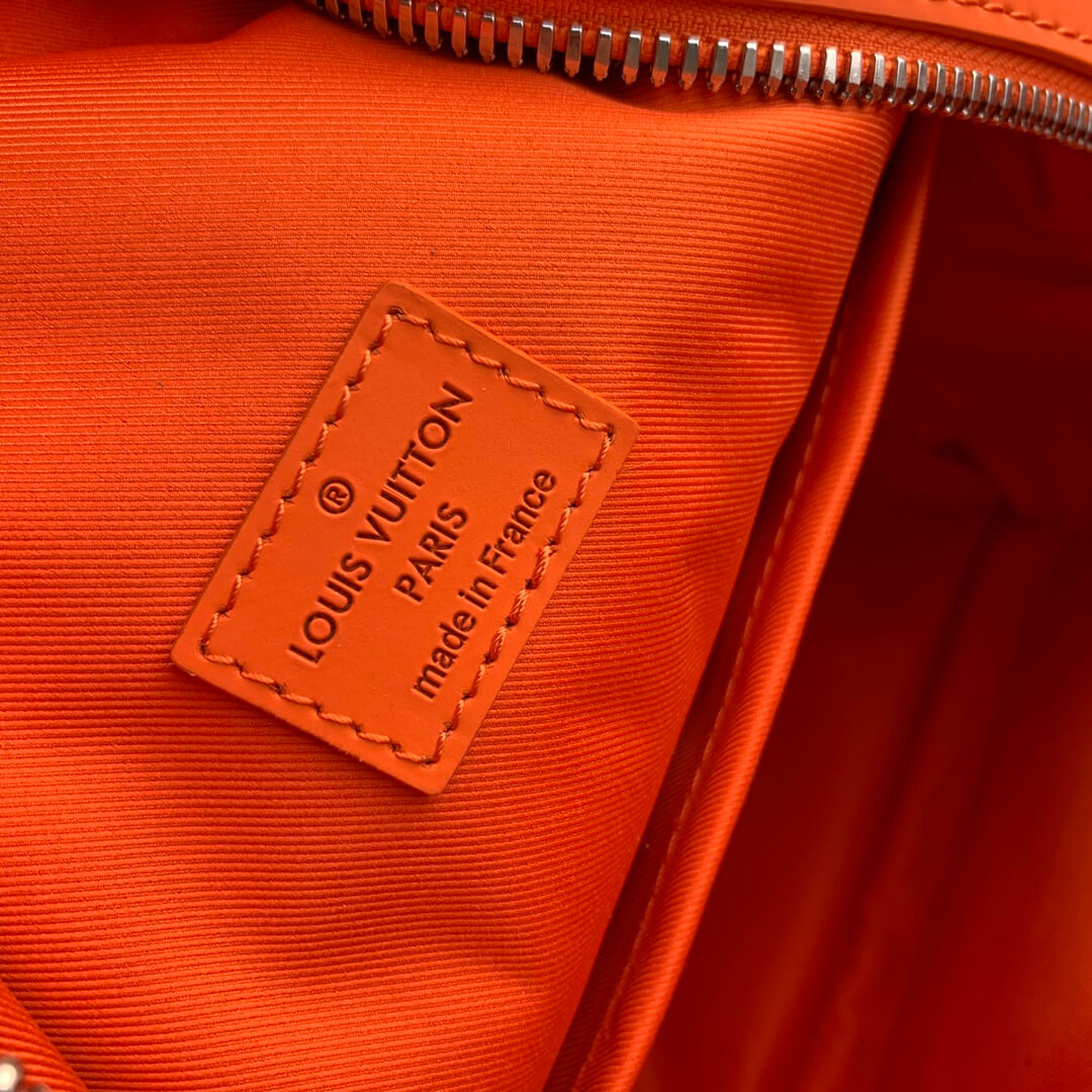 m59325 mens bag backpack aerogram orange calfskin