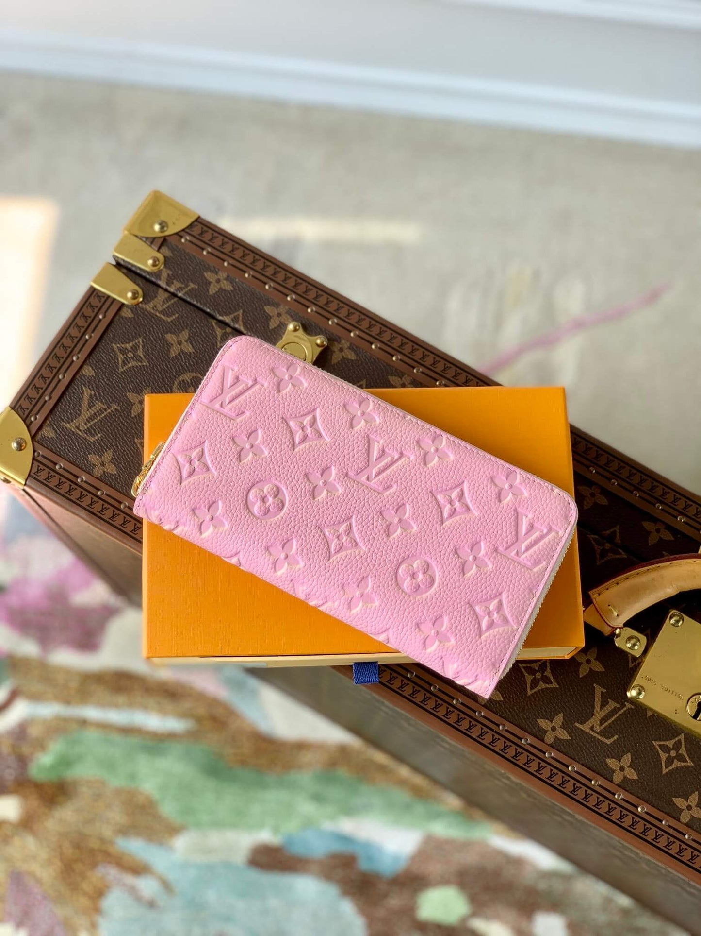 m81299 zippy wallet spring in the city monogram empreinte pink wallet