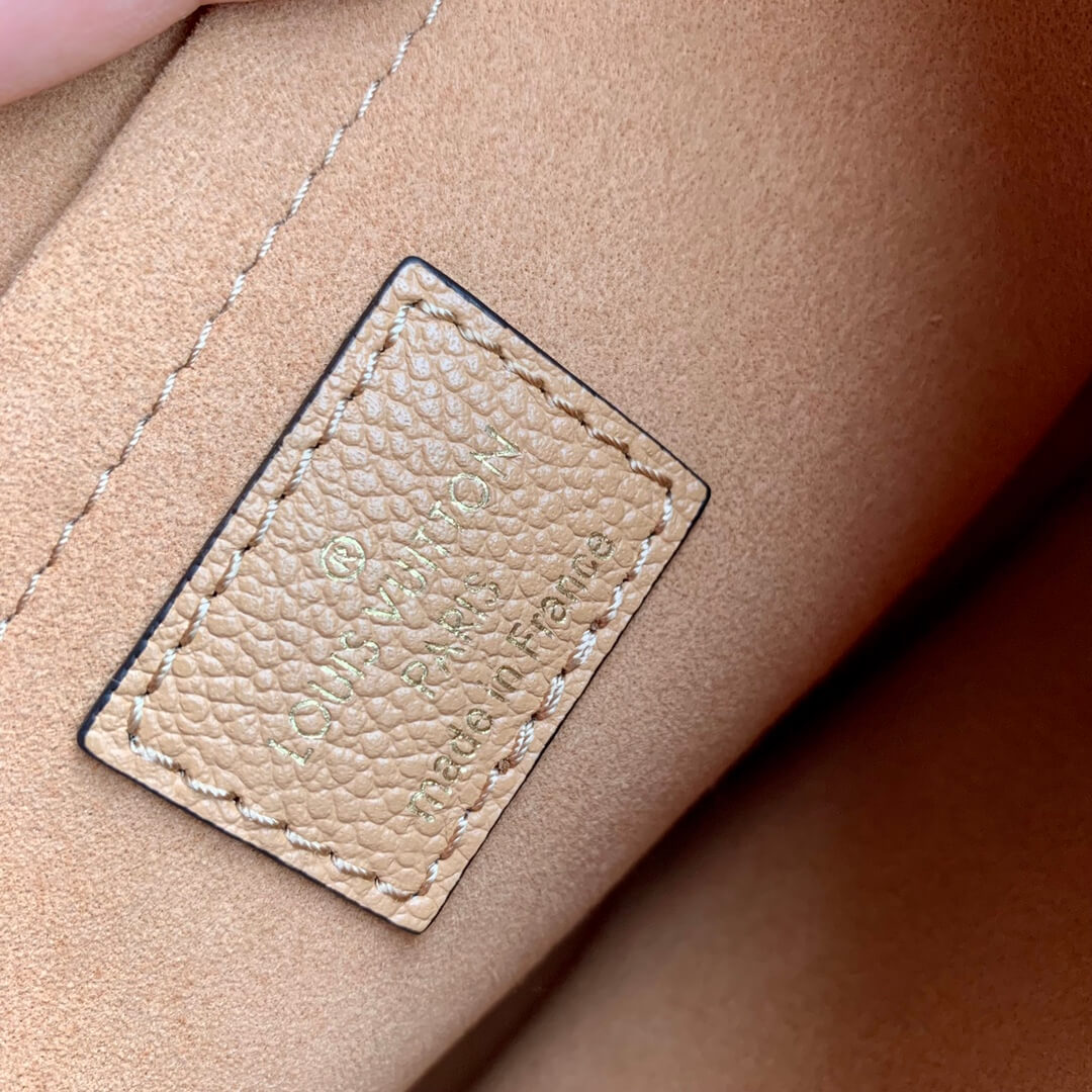 m80399 multi pochette accessoires monogram empreinte crossbody shoulder bag brown