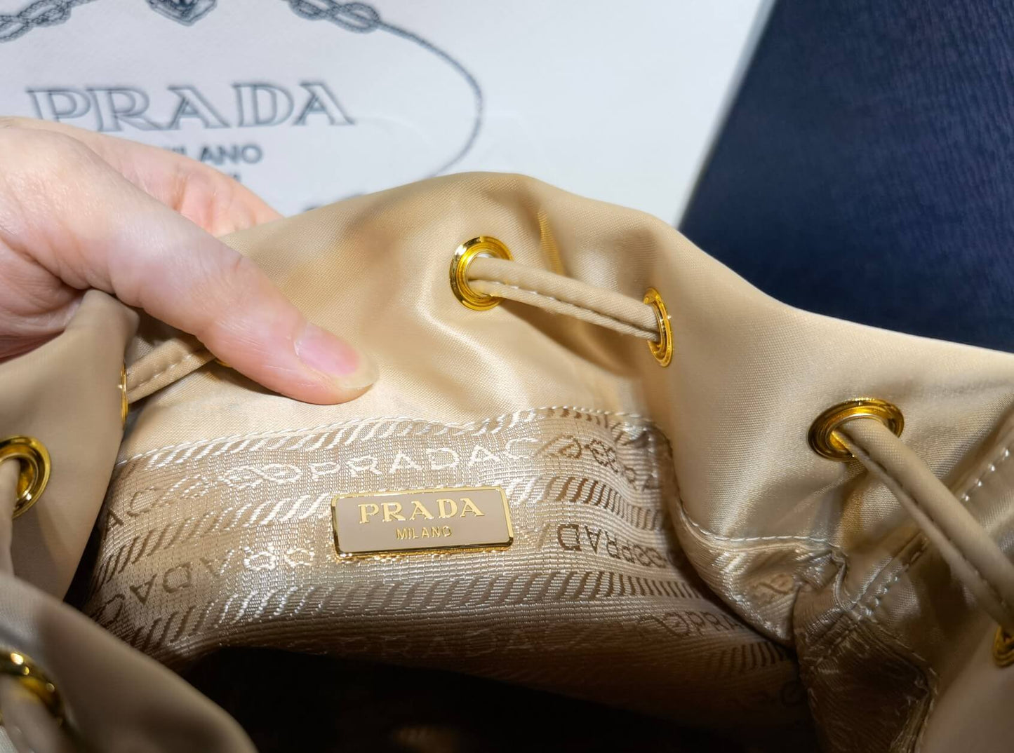 prada duet re nylon bucket bag apricot 1bh038