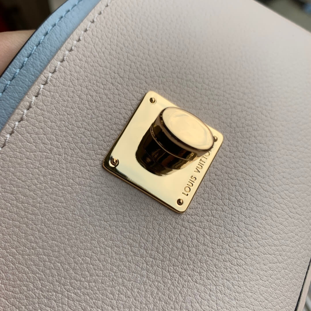 m58557 lockme tender shoulder bag cross body bags blue lambskin