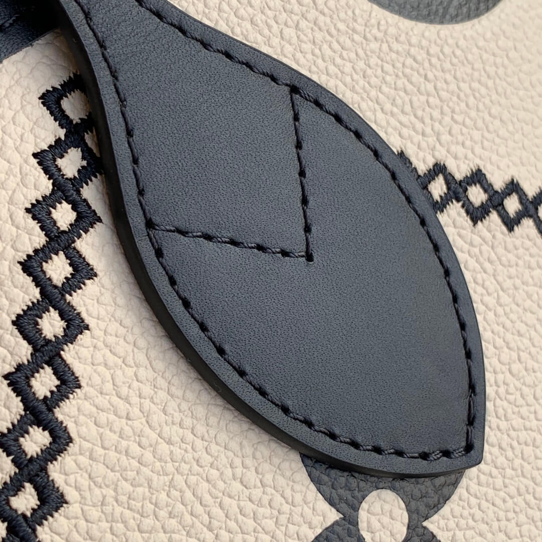 louis vuitton neverfull mm monogram malletage empreinte m46039 white tote