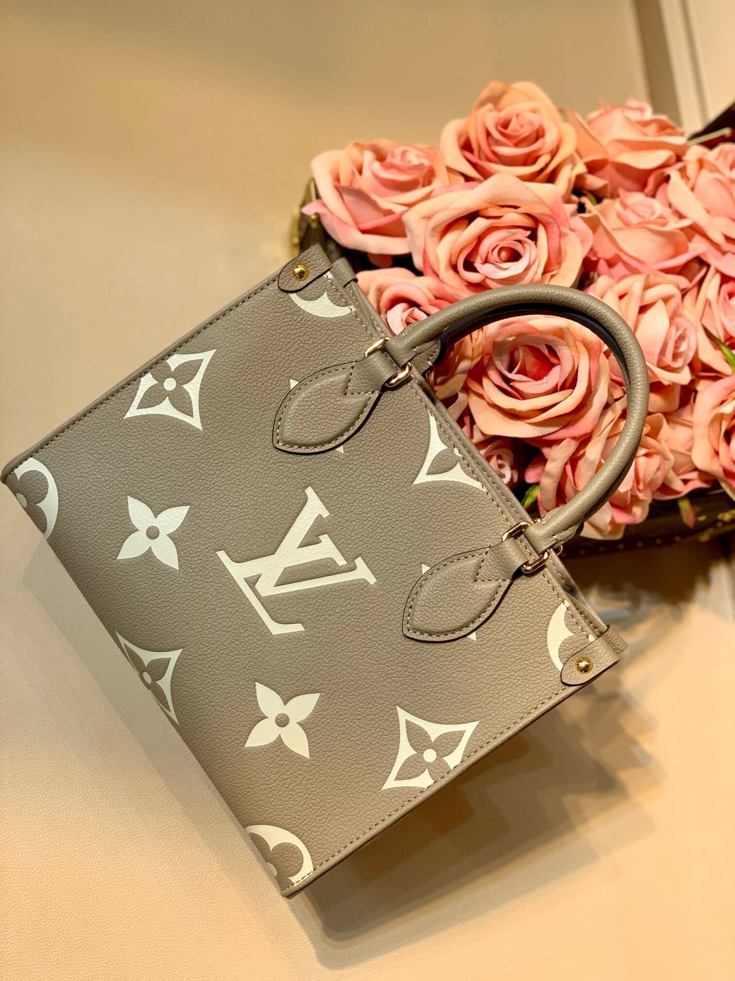 lv onthego pm tote bag monogrm empreinte leather grey m45659