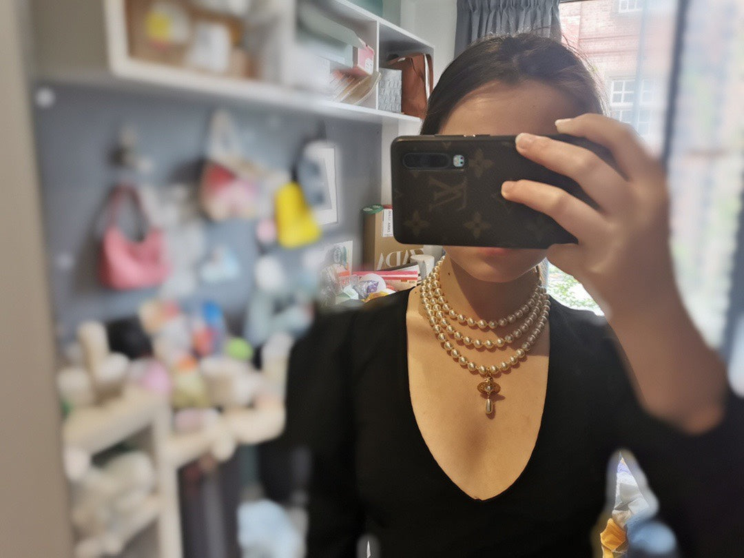 hot selling fashionable three layer pearl necklace with planet flying saucer collarbone chain xla52