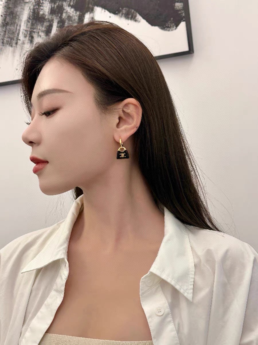 celines new black enamel personalized bag with gold earrings eha101