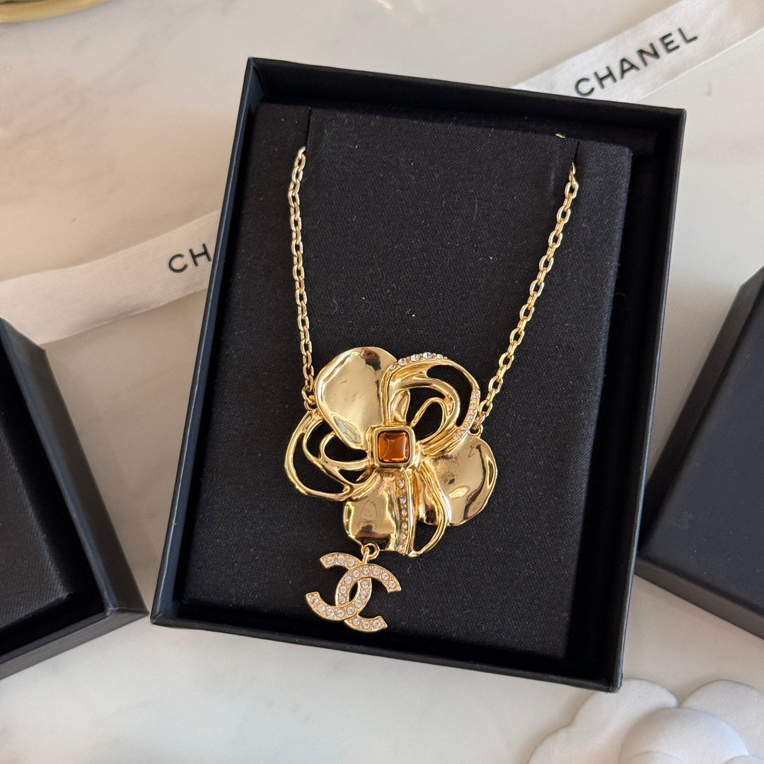 golden camellia blossom hollow gem brooch xzc7