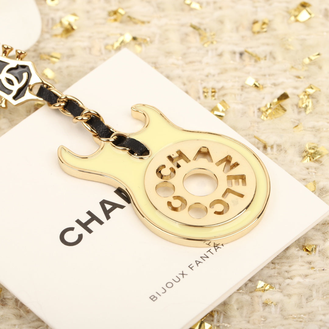 cha avocado green guitar brooch eha230