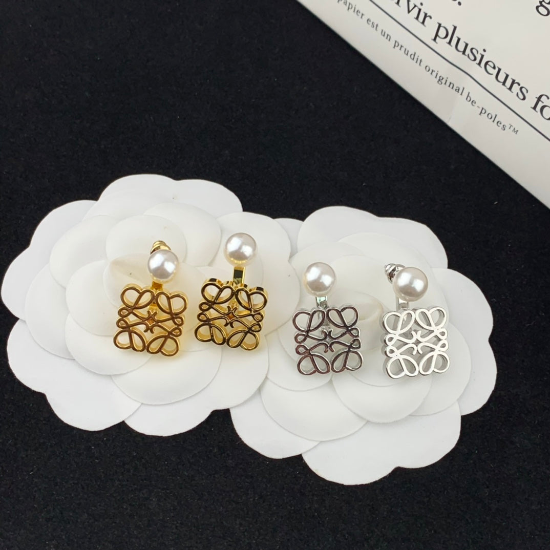 pearl hanging directional hollow earrings eha363
