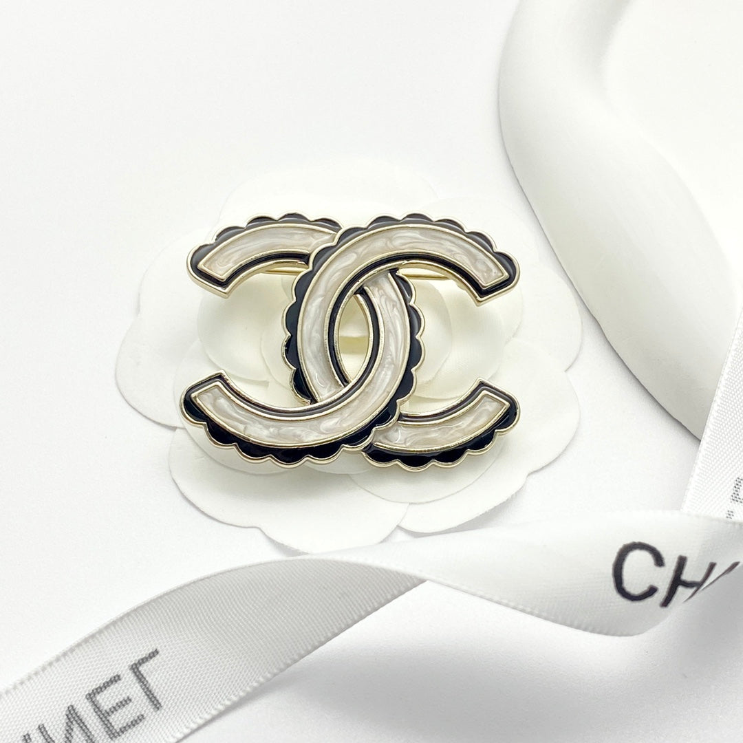 24 black enamel lace double c brooch xza13