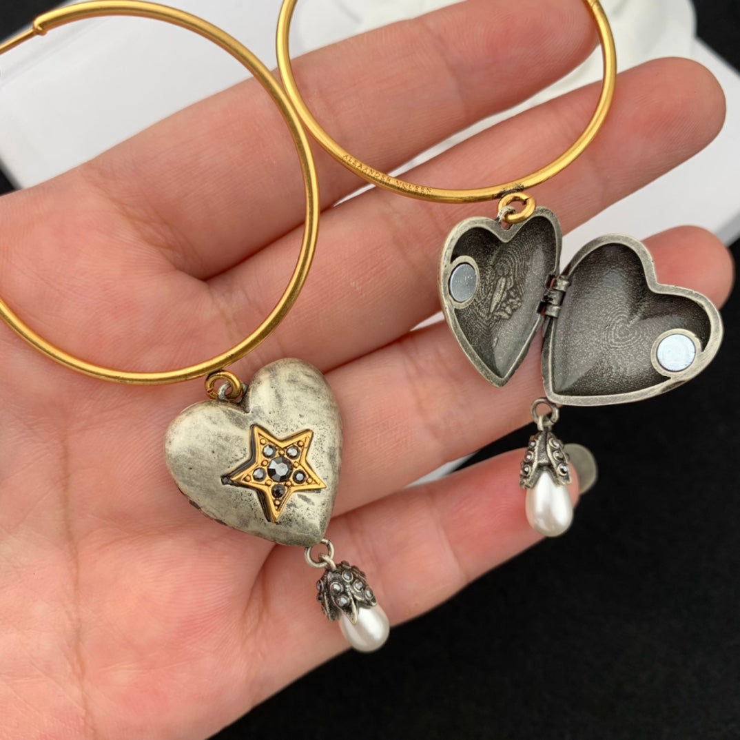 mcqueen heart shaped yellow gold earrings eha670