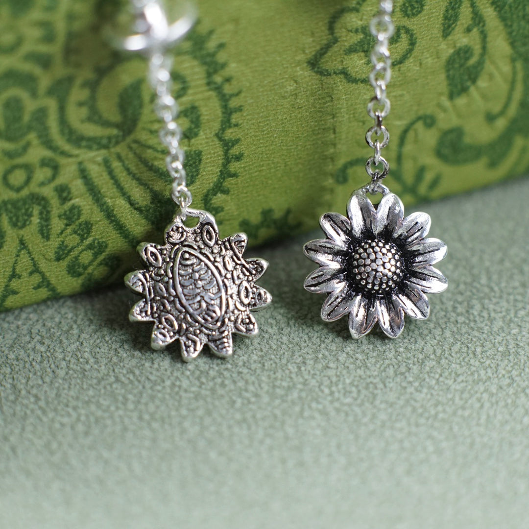 interlocking double g daisy silver bracelet sla126