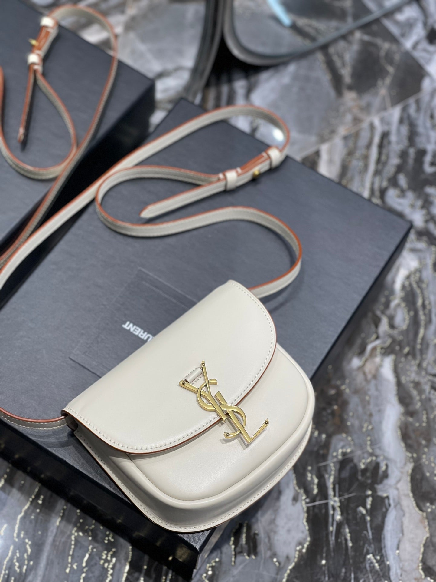 ysl5561240940 kaia small saddle bag white gold hardware 619740