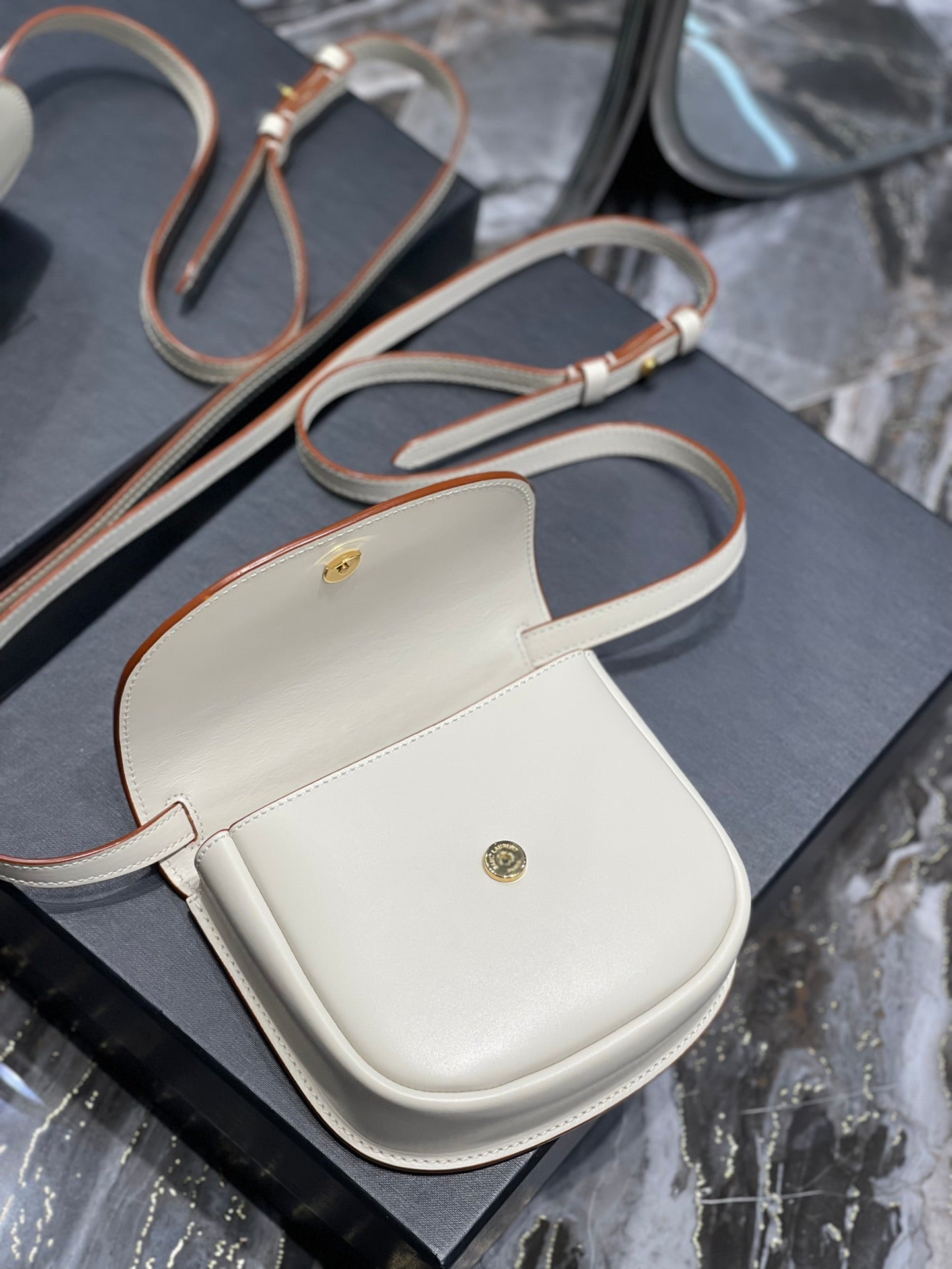 ysl5561240940 kaia small saddle bag white gold hardware 619740