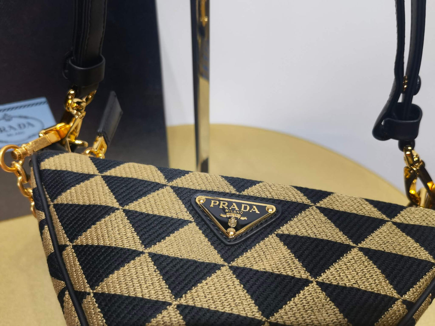 1bc176 prada symbole leather and fabric mini bag black beige