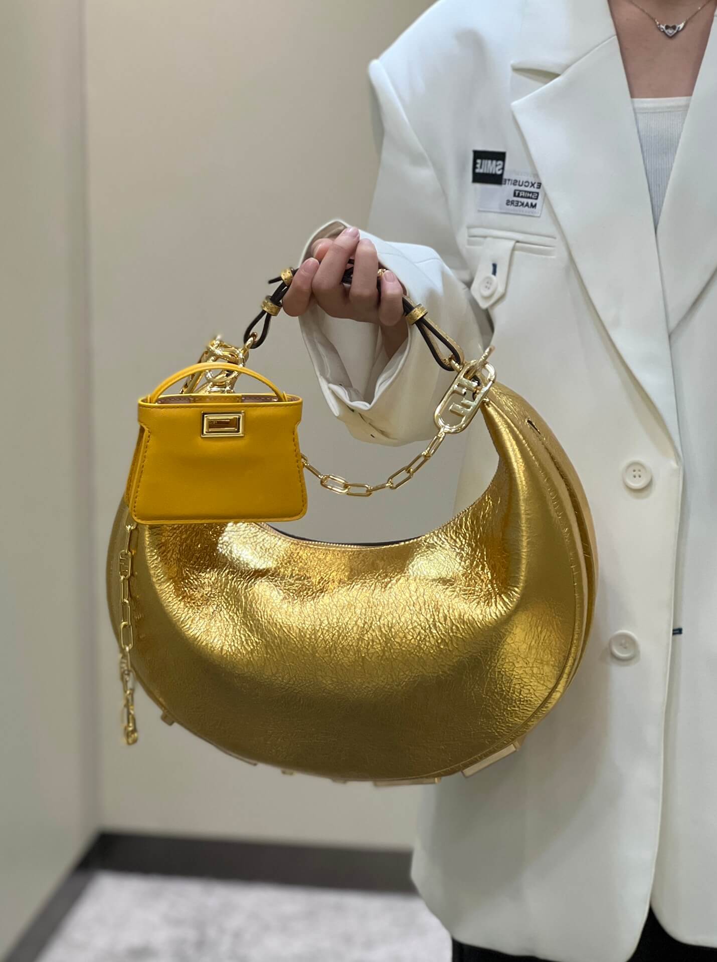 80056 fd ndigraphy small gold leather bag