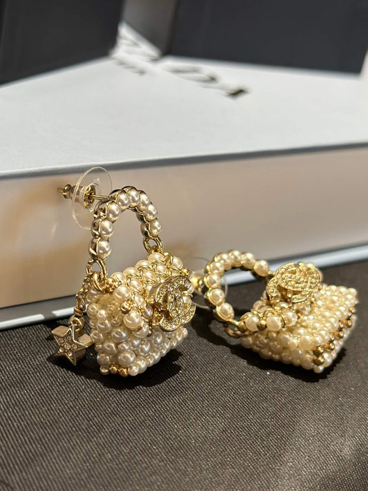 chanels new pearl woven bag star double c earrings ehc3