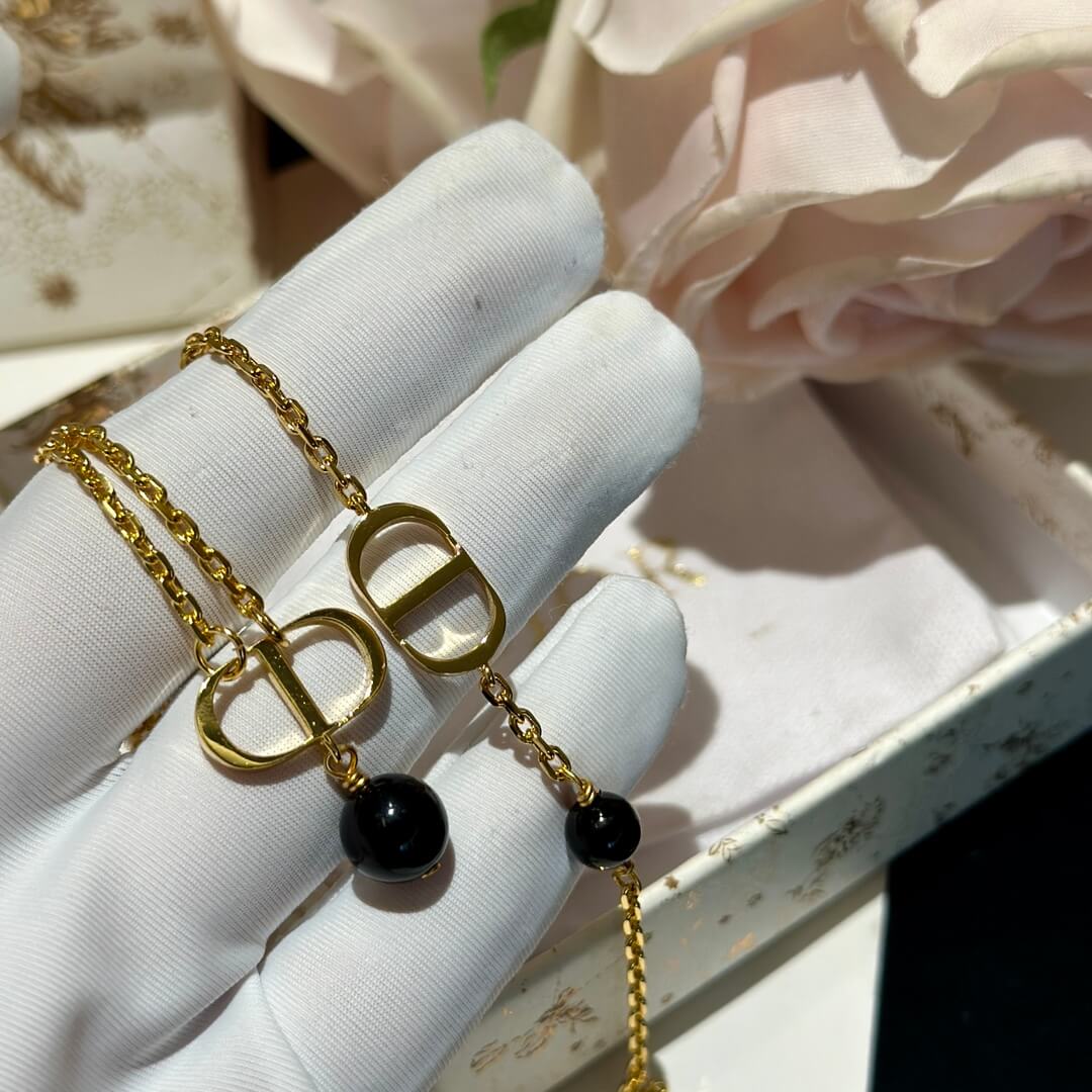 hanging pearl fashion versatile cd black pearl necklace and single chain bracelet xlc30