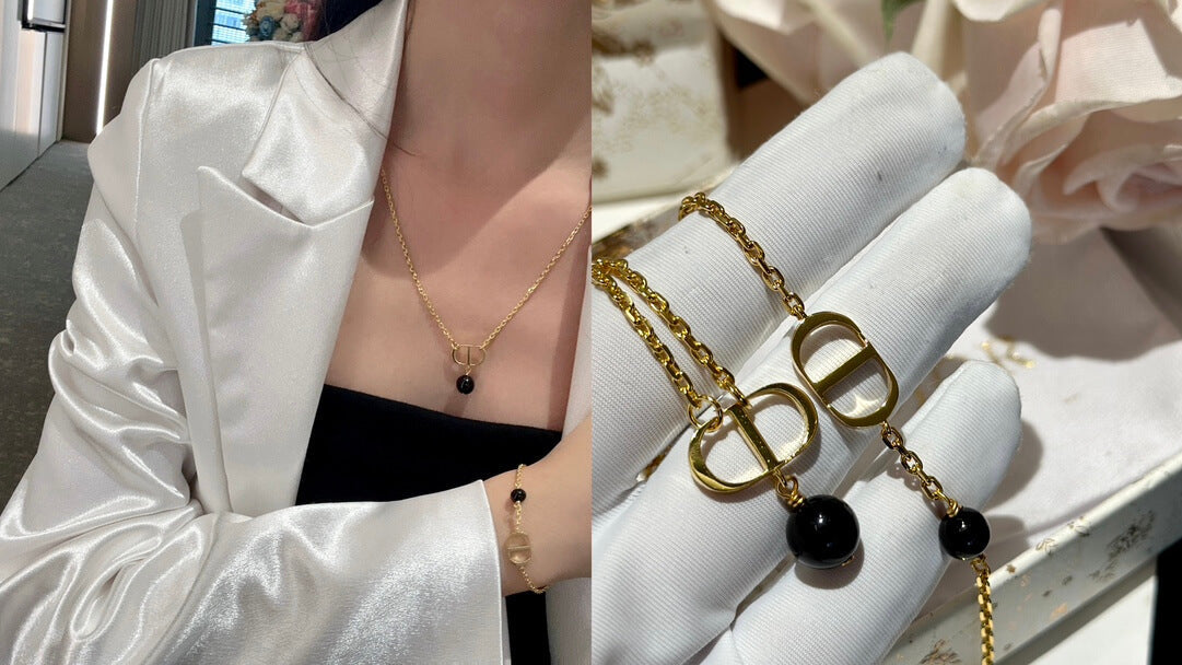 hanging pearl fashion versatile cd black pearl necklace and single chain bracelet xlc30