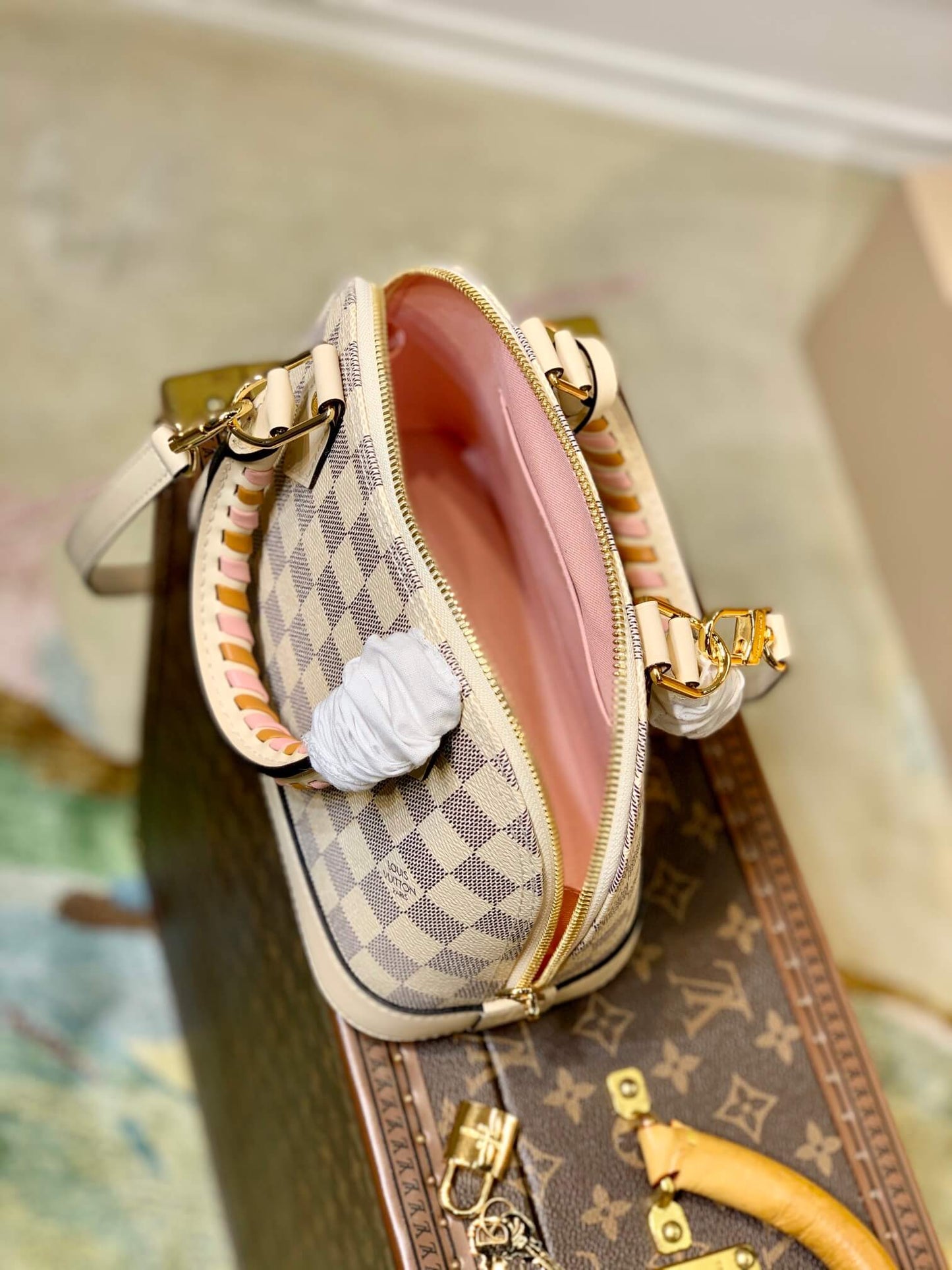 pink inside  of louis vuitton ALMA BB BAG