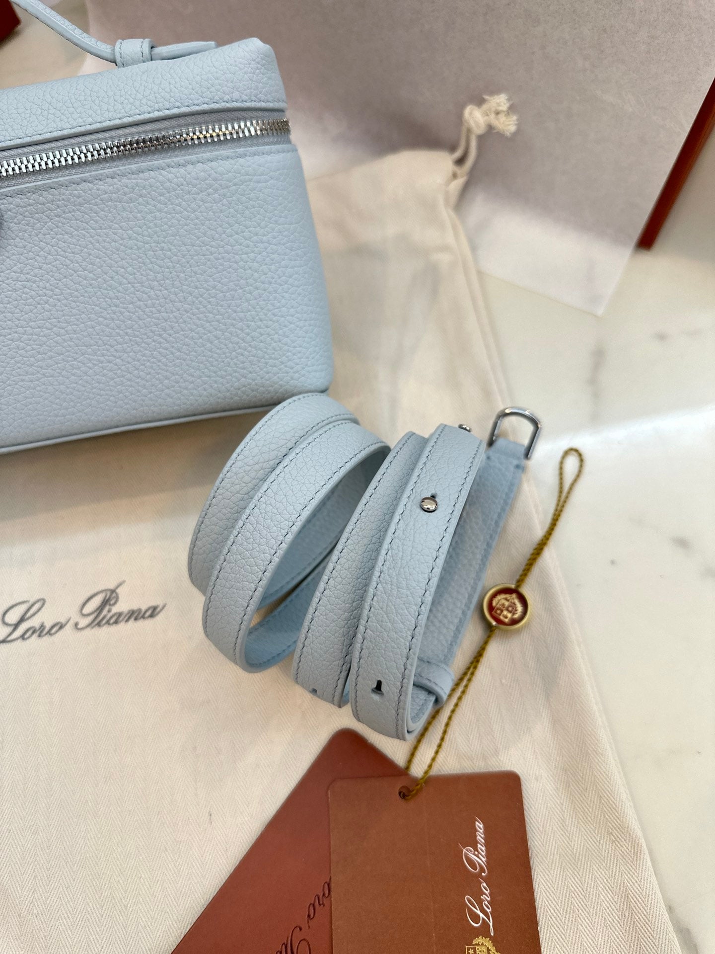loro piana extra poket l19 light blue silver hardware