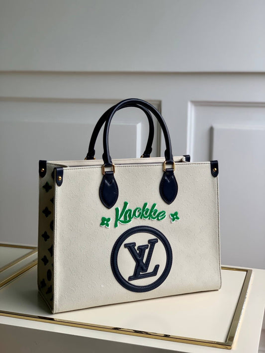 one the go new color black green embroidered