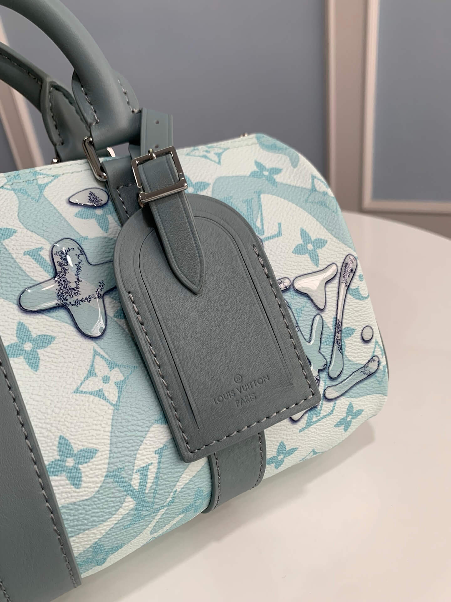 m22527 new keepall bandouliere 25 light blue