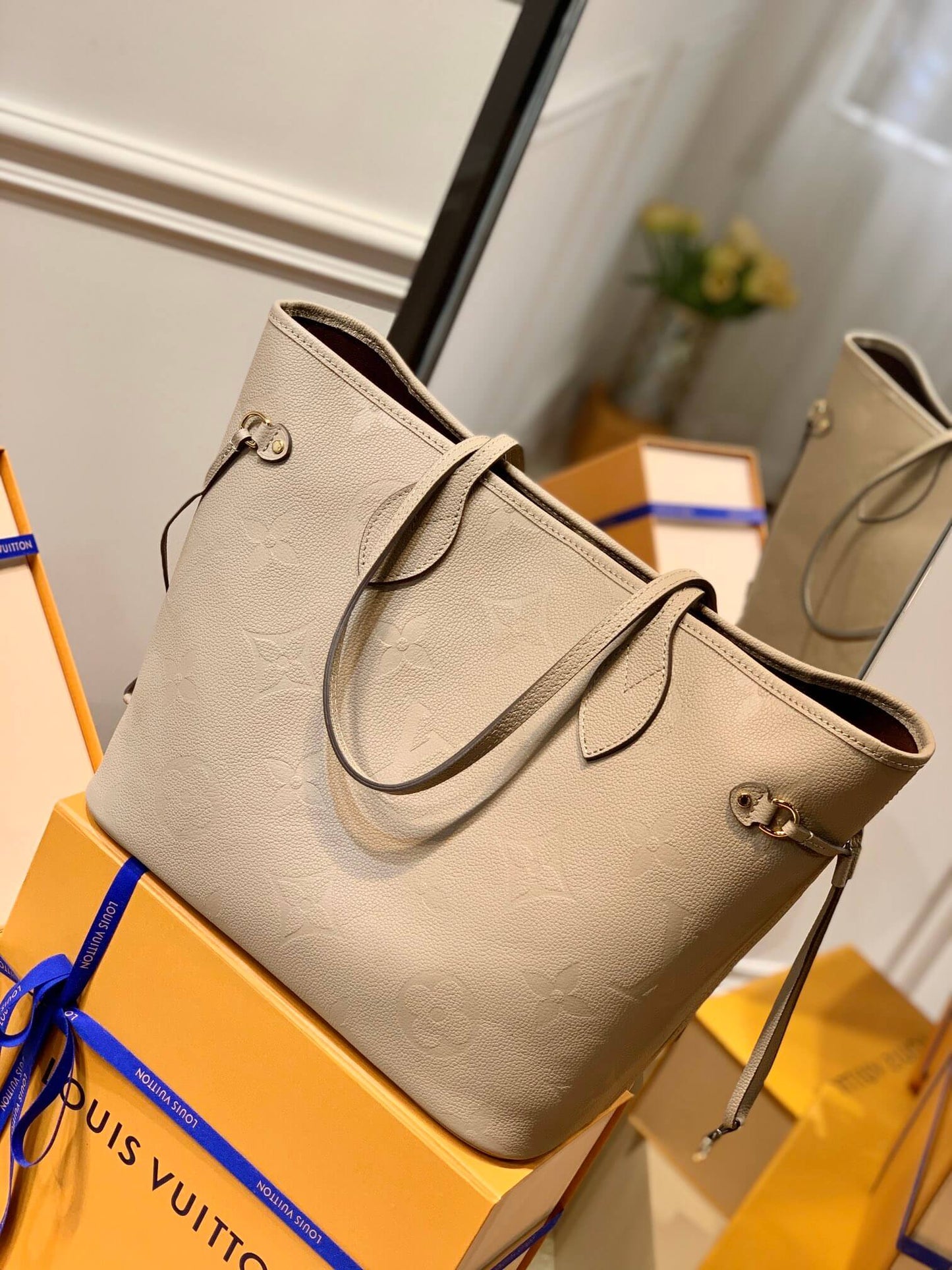 m45646 neverfull mm turtledove embossed monogram empreinte lether