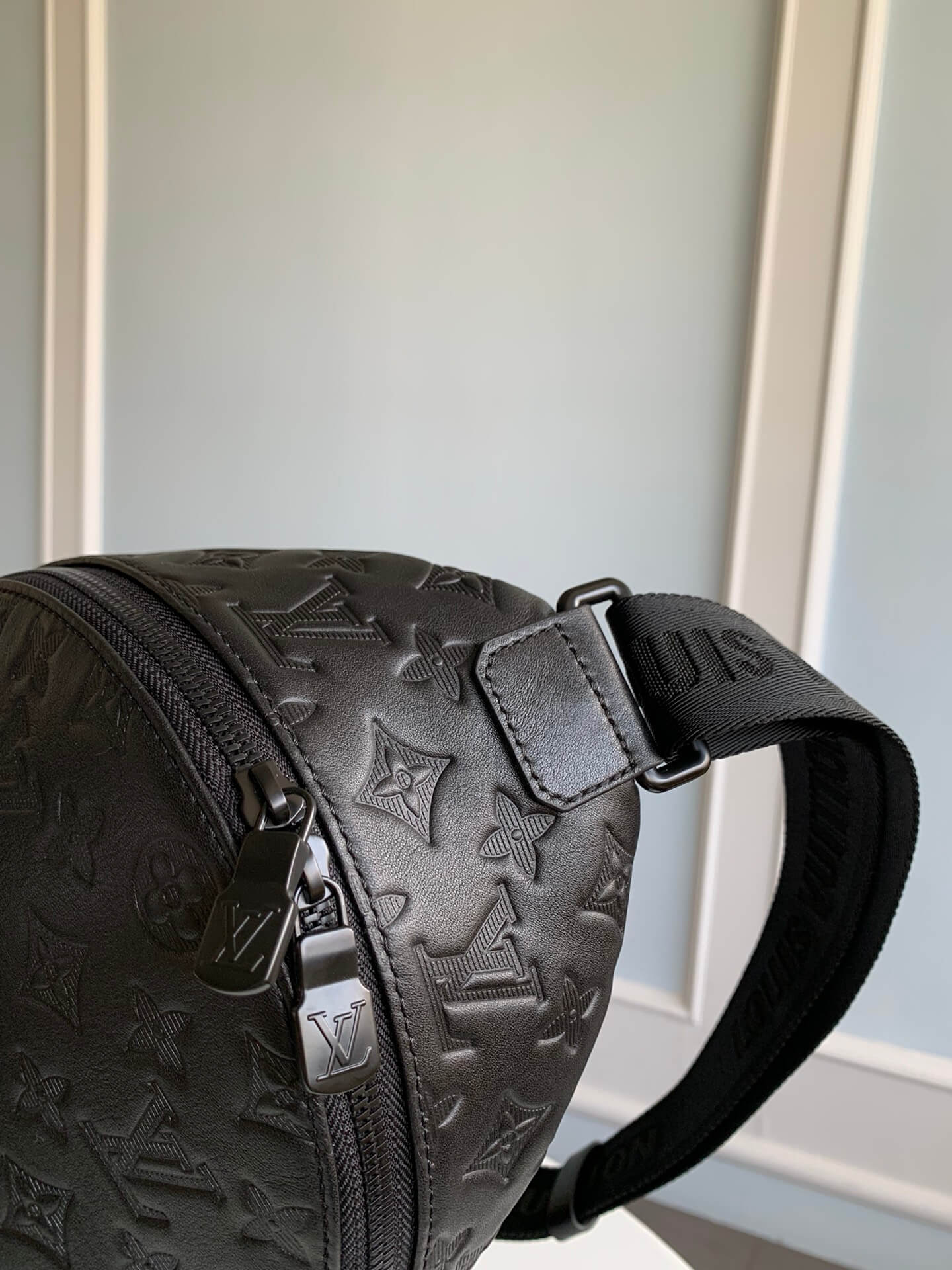 m46107 racer monogram shadow chest bag black calfskin