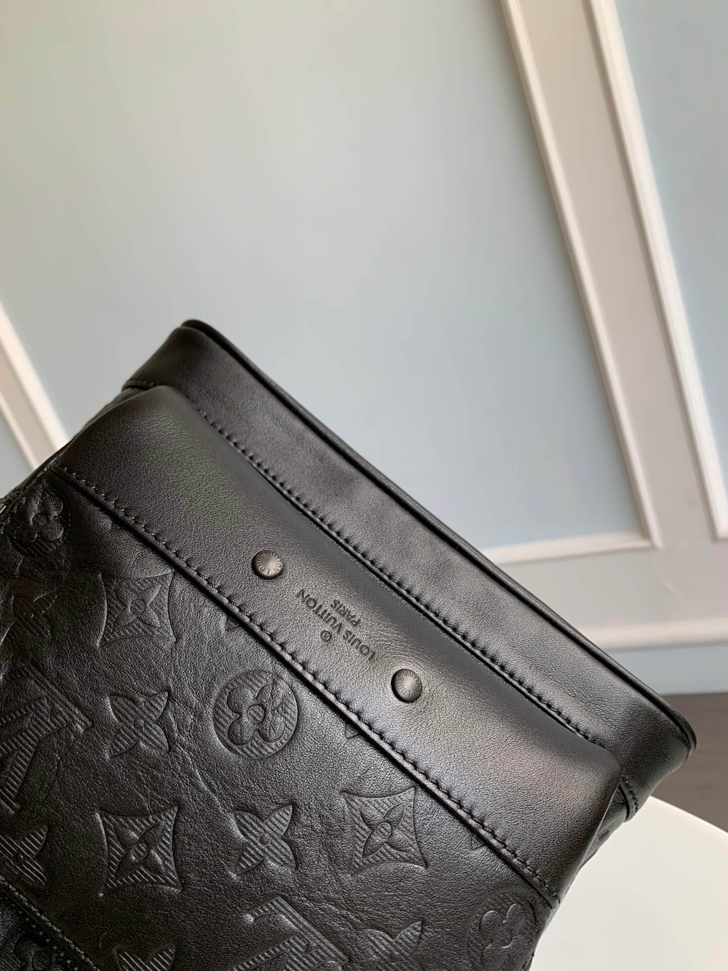 m46107 racer monogram shadow chest bag black calfskin