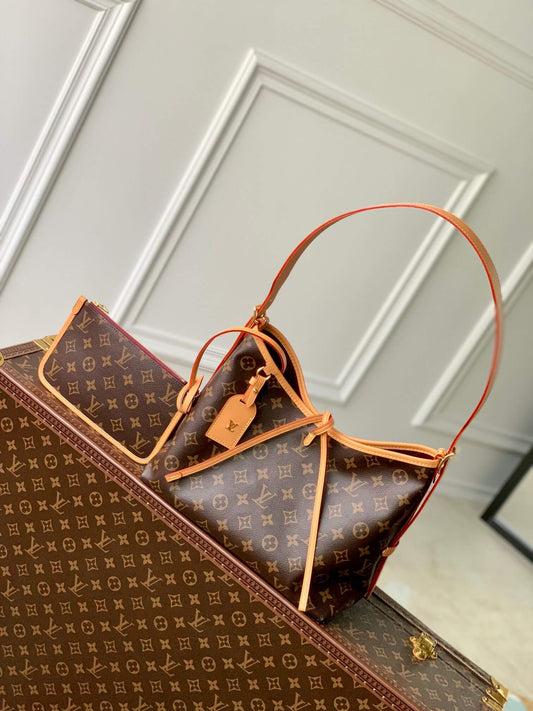 m46203 carryall pm monogram canvas with natural leather trim