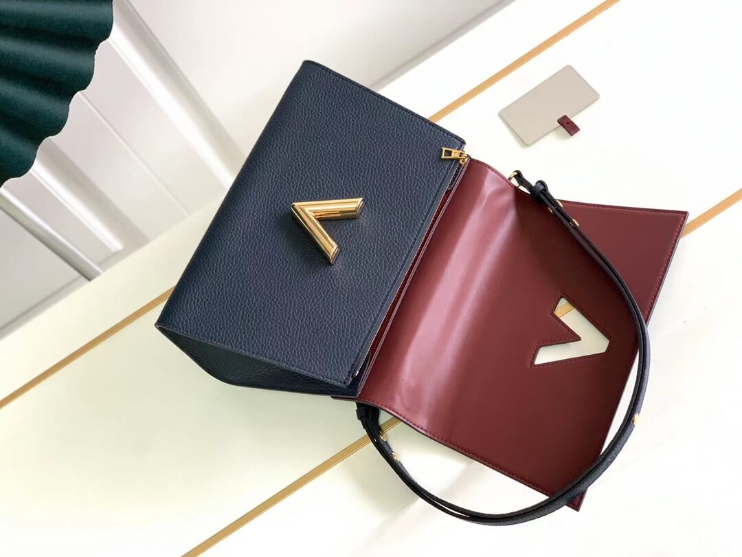 m57090 twist one handle blue handbag 29cm cowhide real leather