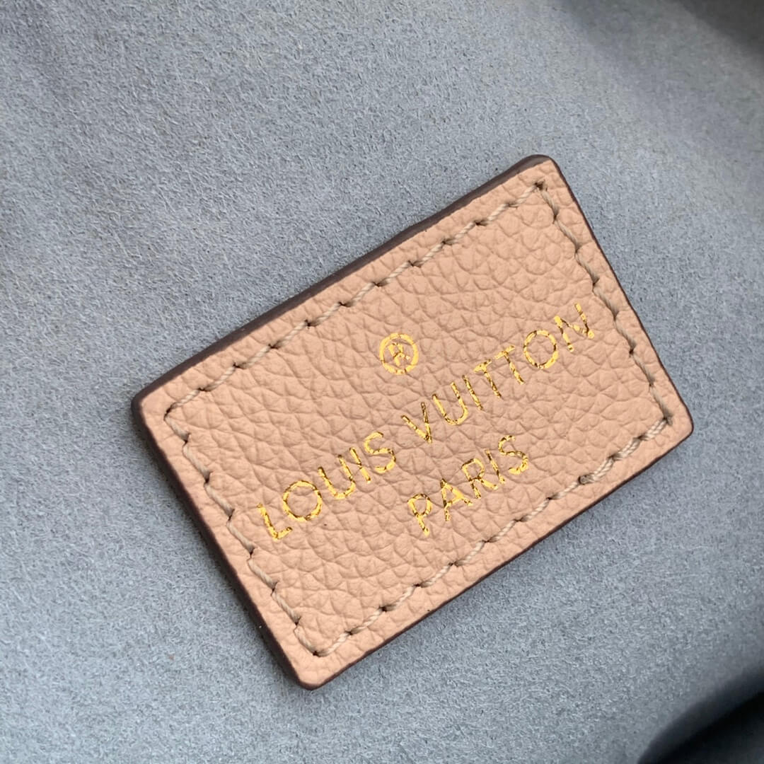 m57800 lockme bucket messenger bucket bag handbag shoulder bag beige lambskin