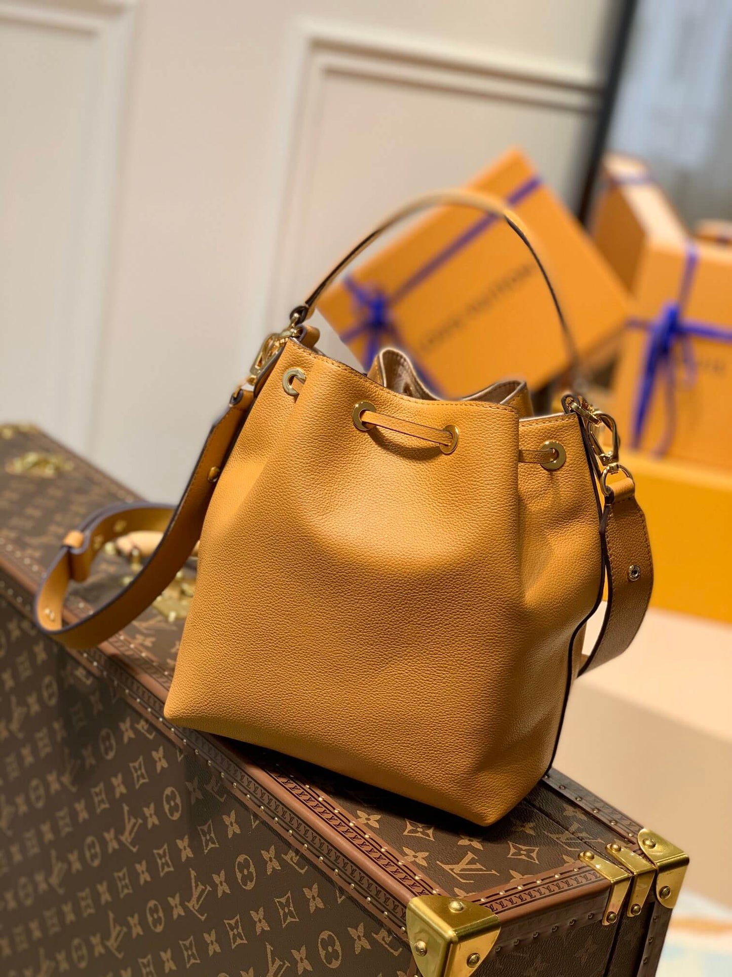 m57800 lockme bucket messenger bucket bag handbag shoulder bag yellow lambskin