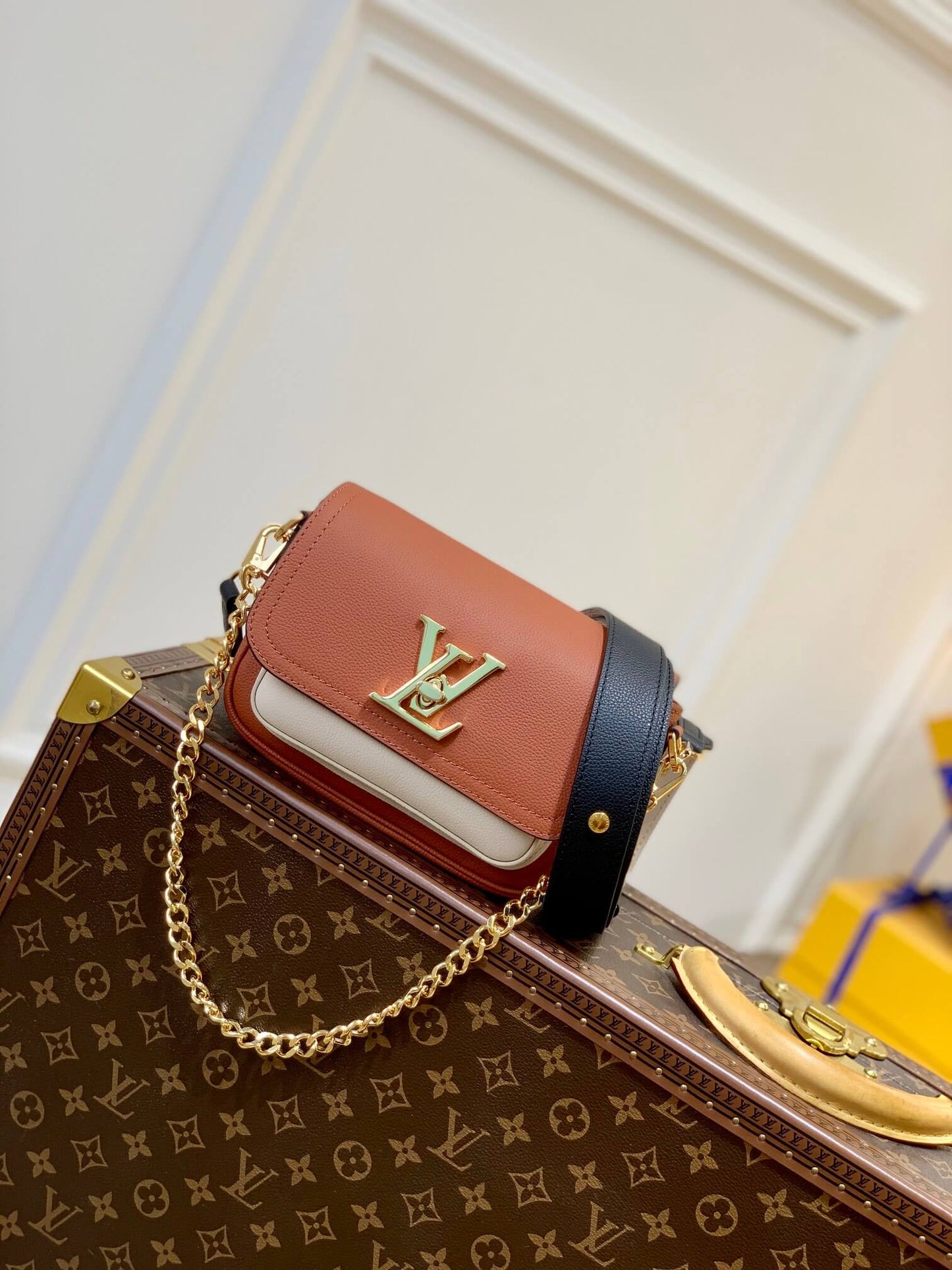m58557 lockme tender shoulder bag cross body bags brown lambskin