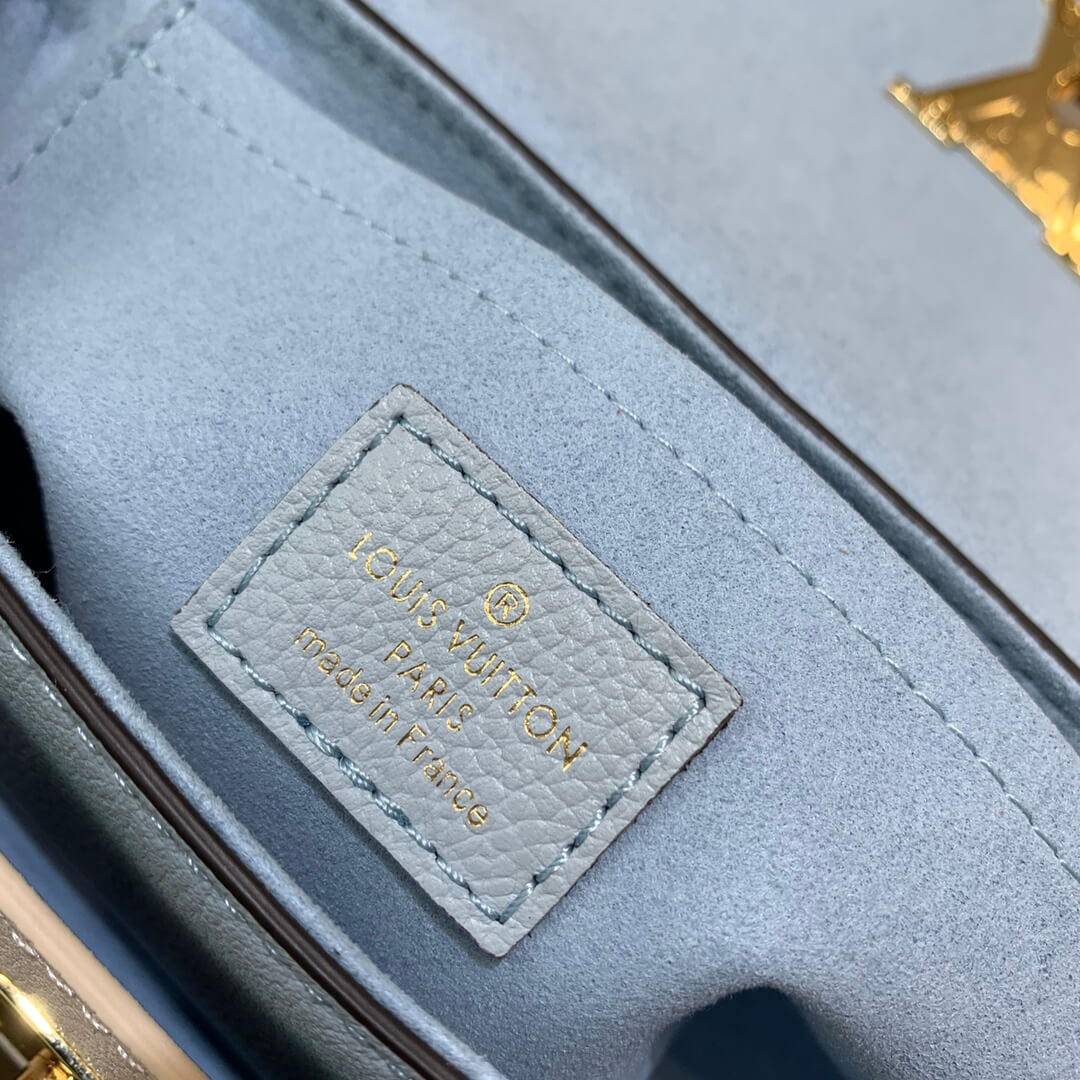 m59984 lockme tender shoulder bag cross body bags blue lambskin