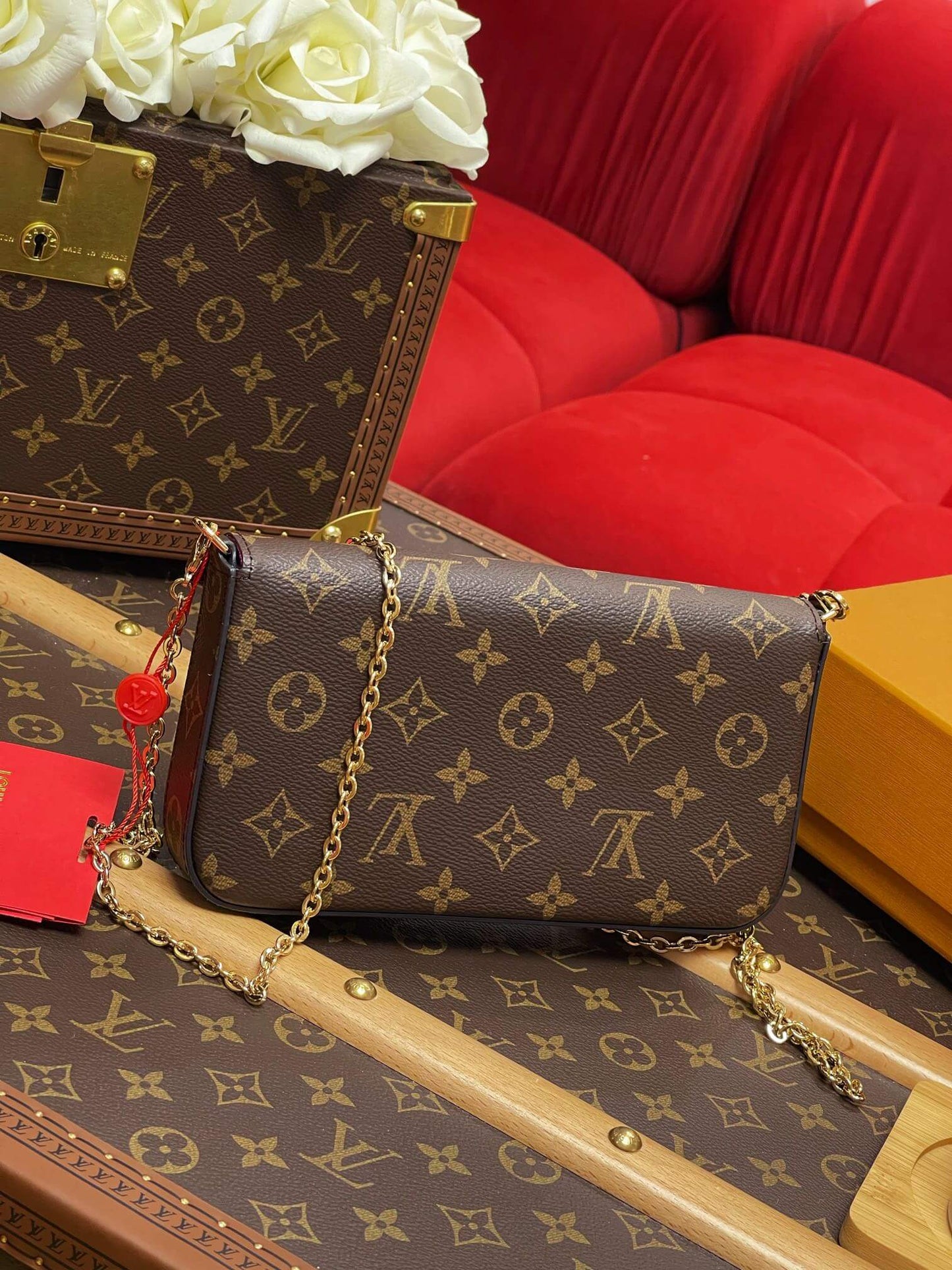 m61276 felicie pochette clutch bag monogram canvas brown maroon inside