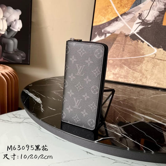 m62295 zippy wallet vertical monogram eclipse canvas black