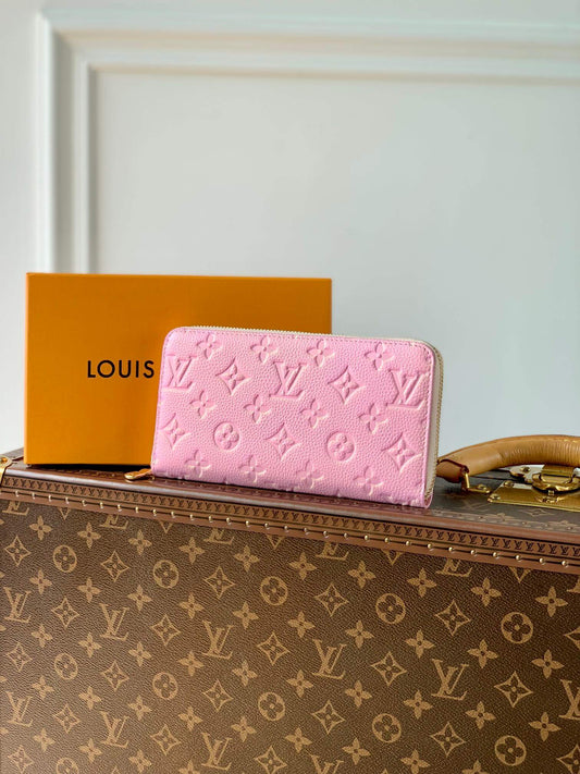 m81299 zippy wallet spring in the city monogram empreinte pink wallet