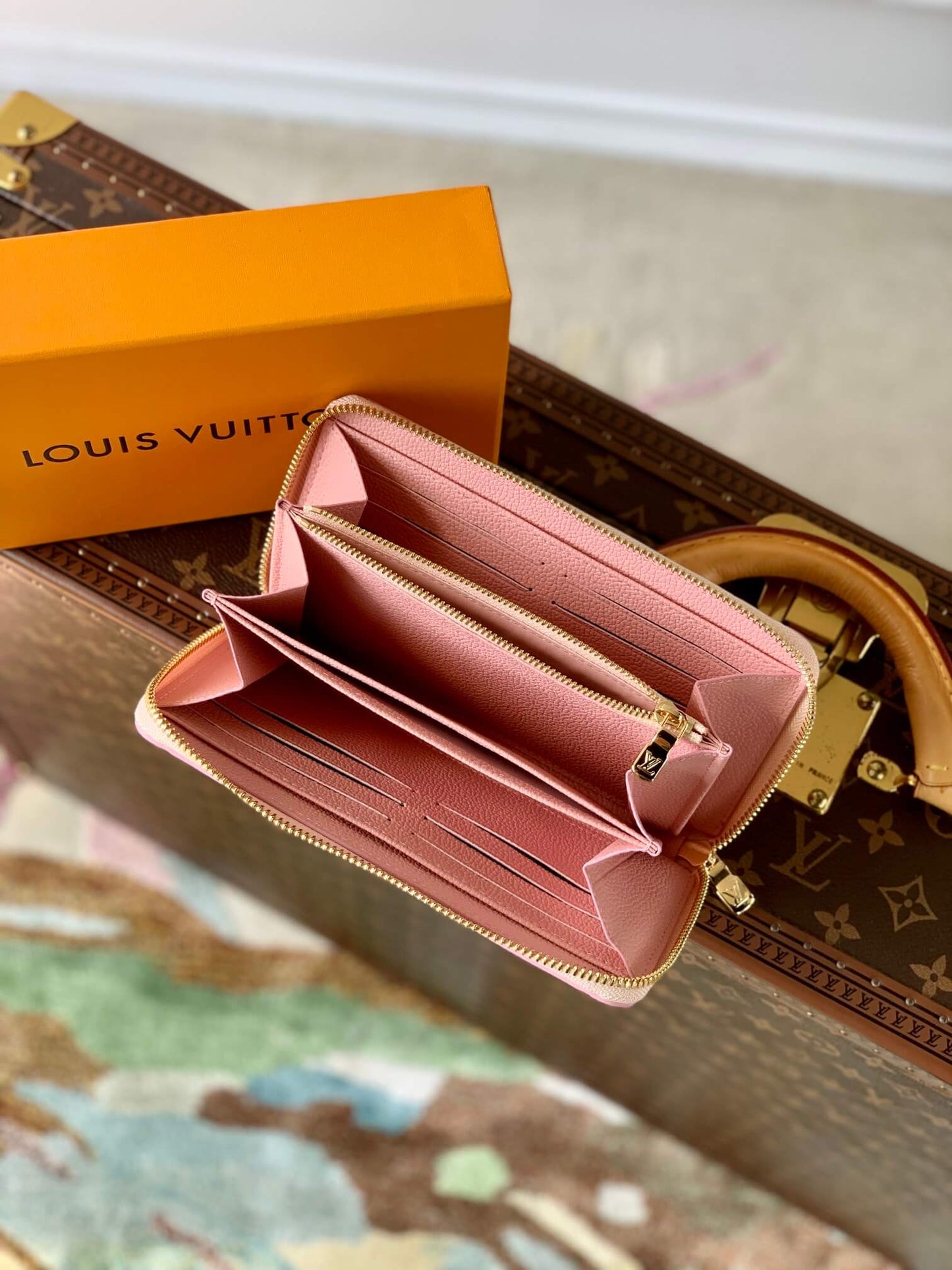 m81299 zippy wallet spring in the city monogram empreinte pink wallet