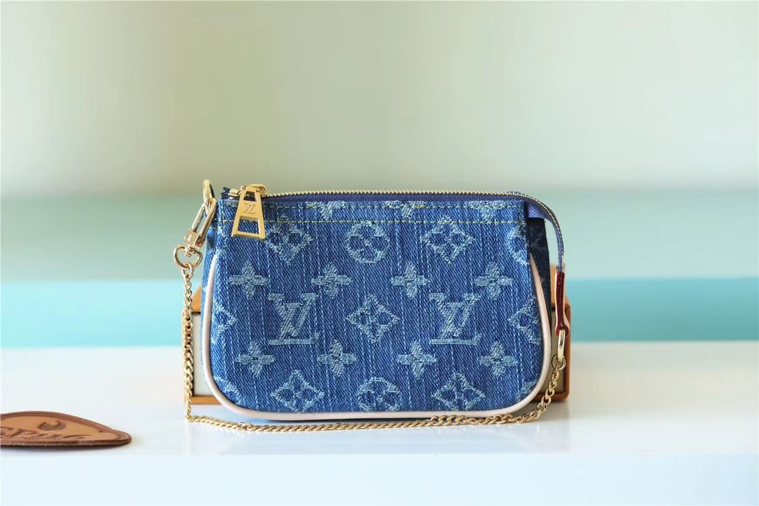 M82960 mini Pochette Accessoires Denim sling bag