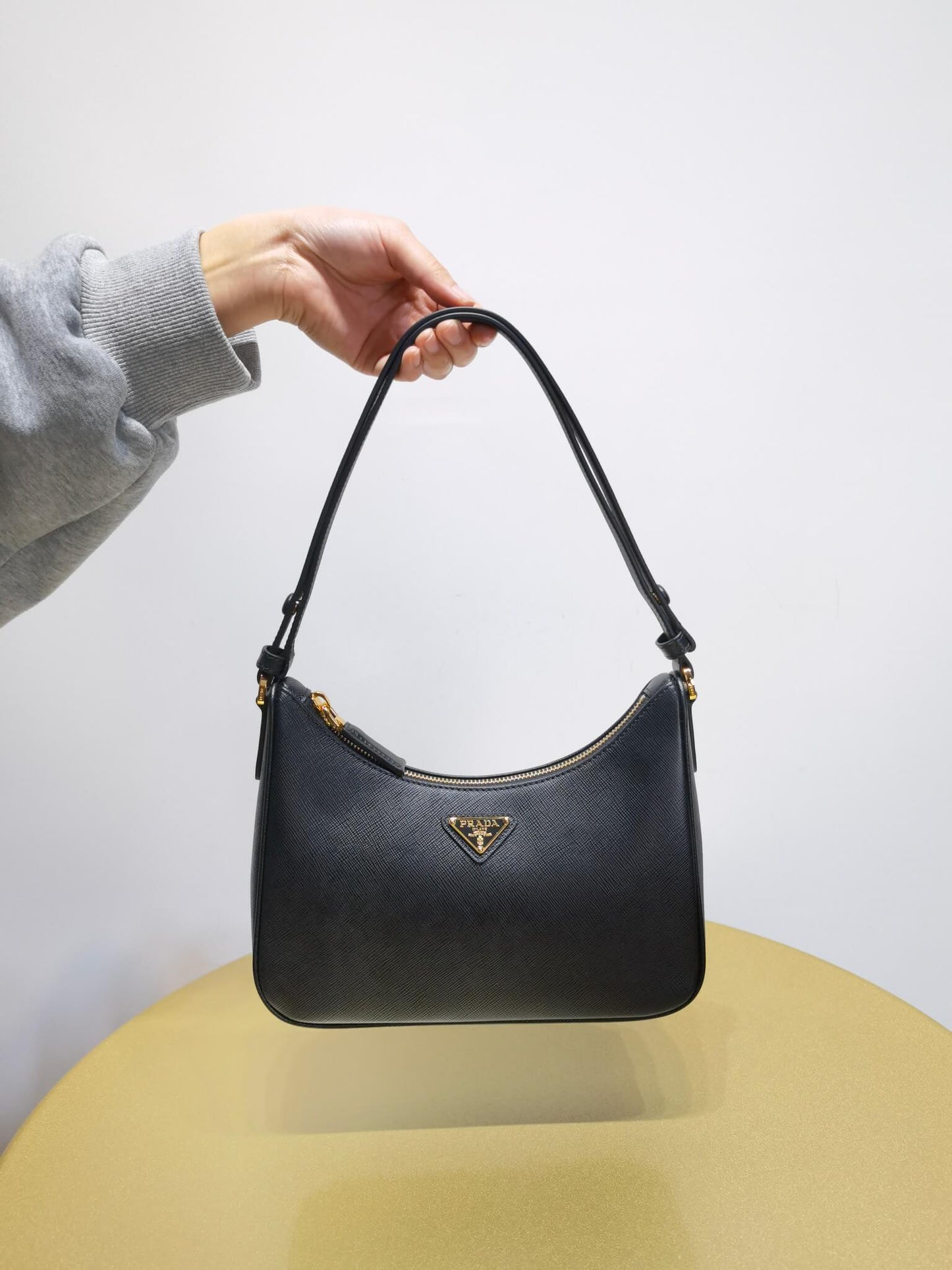 pra re edition saffiano leather mini axillary pouch bag black 1bc204