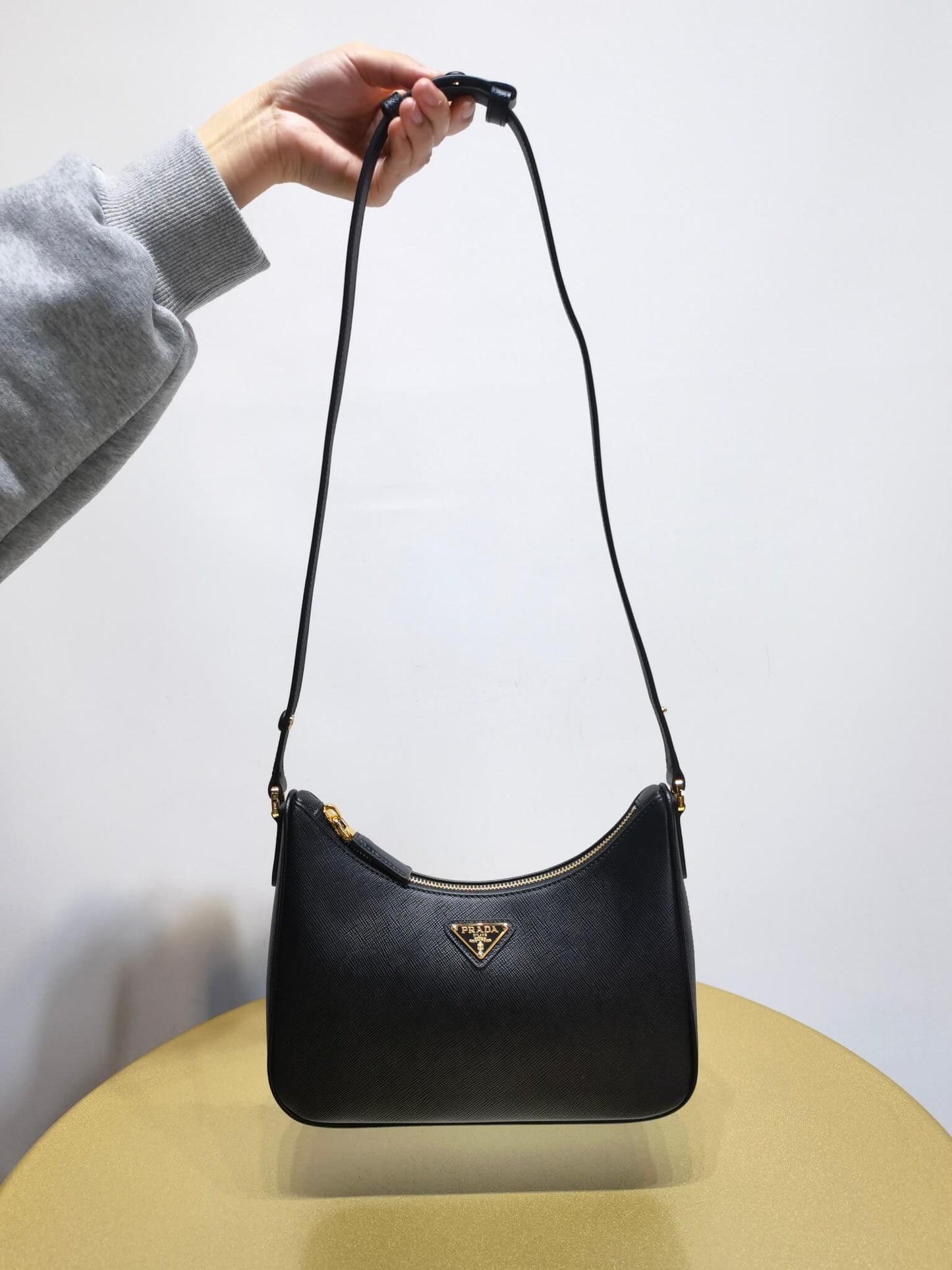 pra re edition saffiano leather mini axillary pouch bag black 1bc204