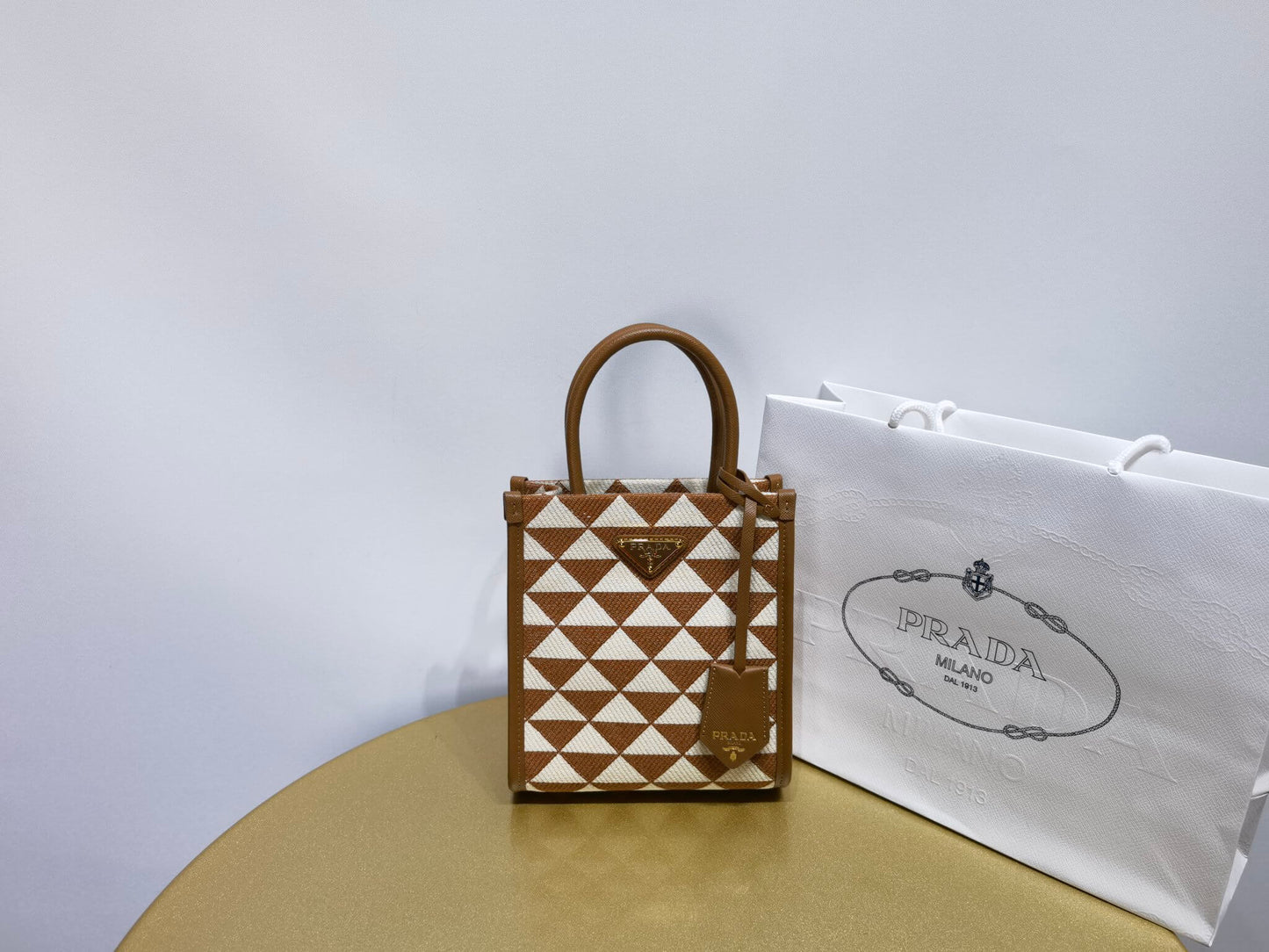 prada symbole embroidered jacquard fabric mini bag tobacco chalk white