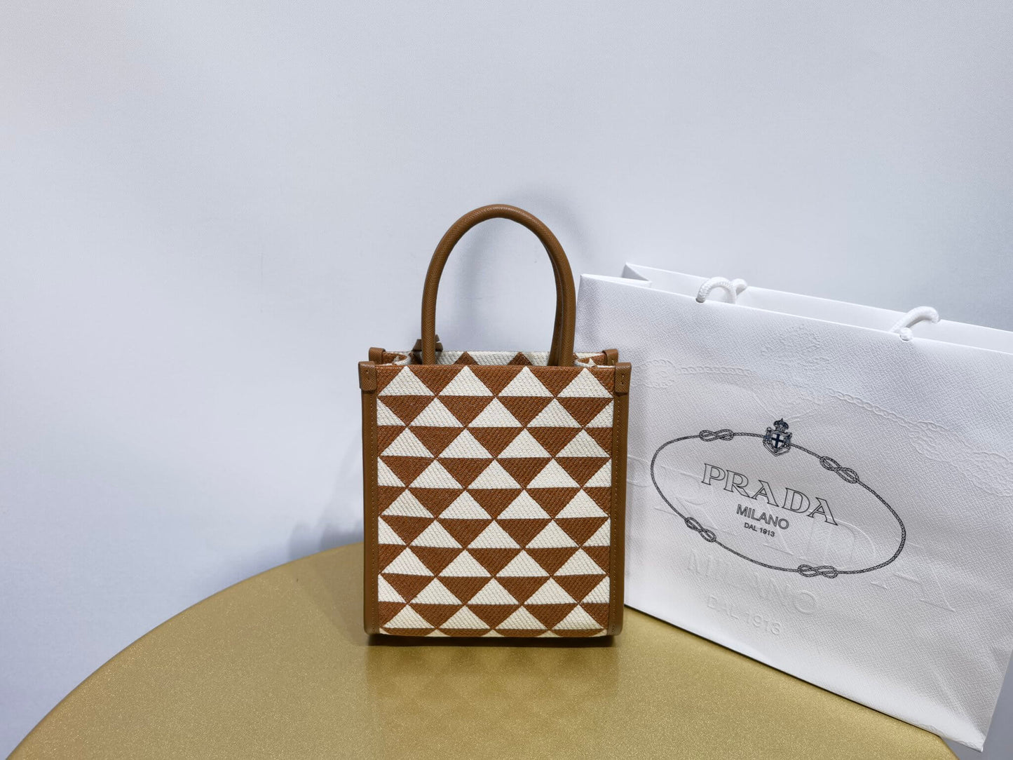 prada symbole embroidered jacquard fabric mini bag tobacco chalk white