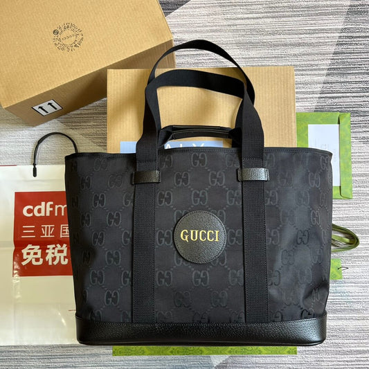 gg746037 off the grid handbag 39cm black cowhide