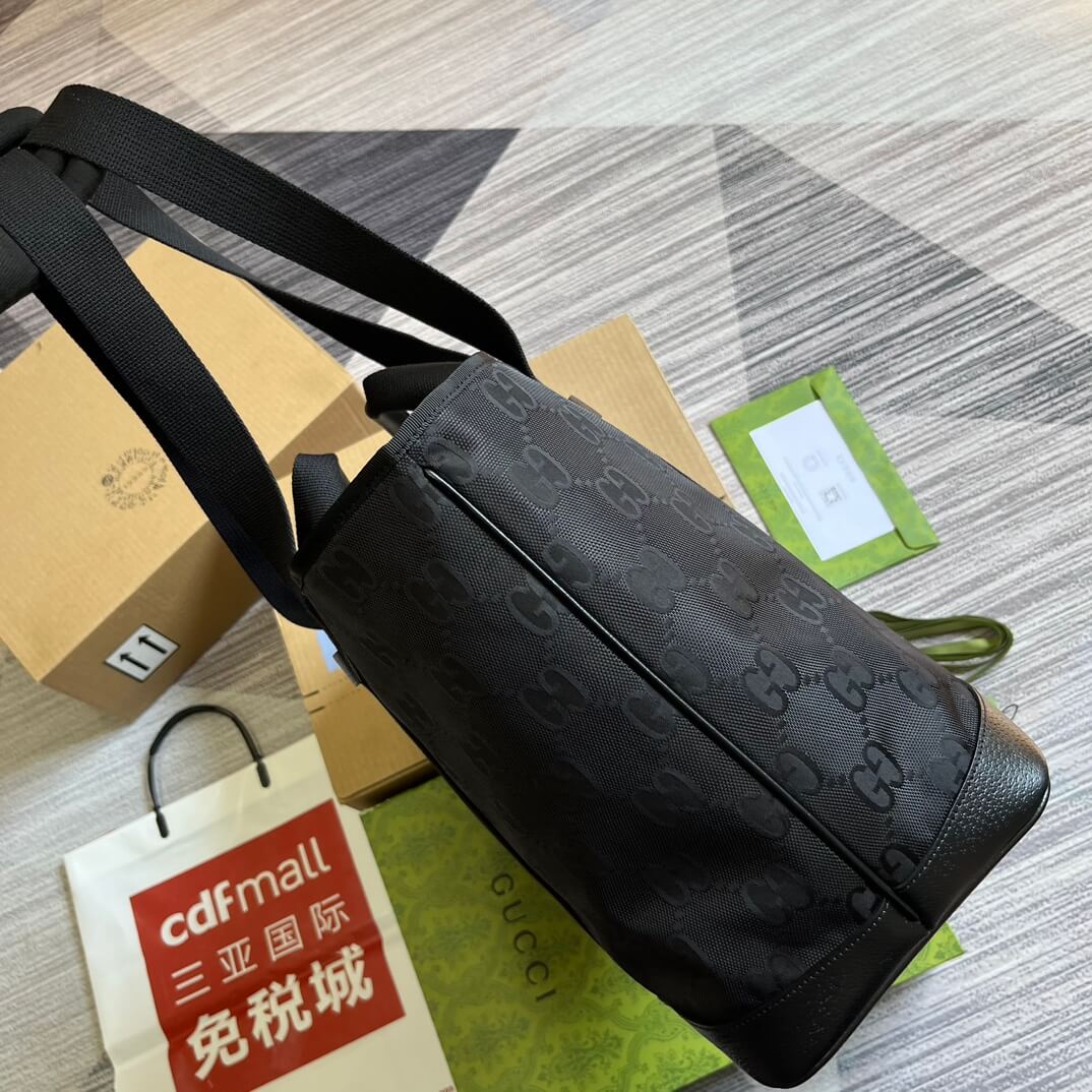 gg746037 off the grid handbag 39cm black cowhide