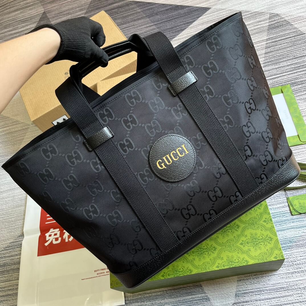 gg746037 off the grid handbag 39cm black cowhide